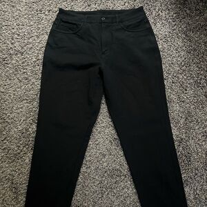 Kit and Ace Black Pants with Bright Blue Size Tag